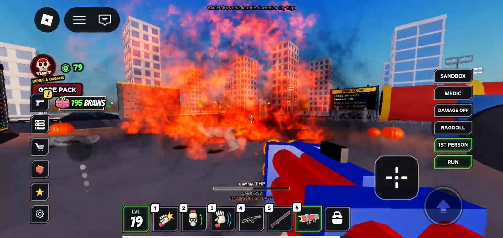 Ragdoll Reality mobile combat captures a fireworks explosion engulfing a dummy after the on-screen tip says fireworks launch dummies sky high with the toy launcher selected.